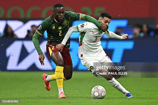 Cameroon's defender Junior Tchamadeu and Morocco's defender Noussair Mazraoui fights for the ball during the Africa Cup of Nations quarter-final...