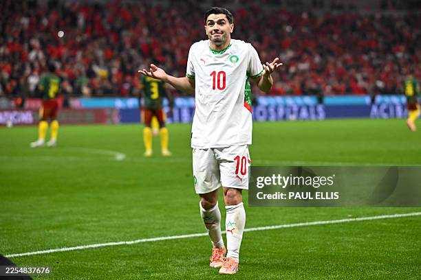Morocco's forward Brahim Diaz celebrates scoring his team's first goal during the Africa Cup of Nations quarter-final football match between Cameroon...