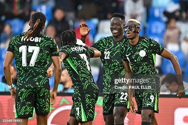 Nigeria's forward Victor Osimhen celebrates scoring his team's first goal during the Africa Cup of Nations quarter-final football match between...
