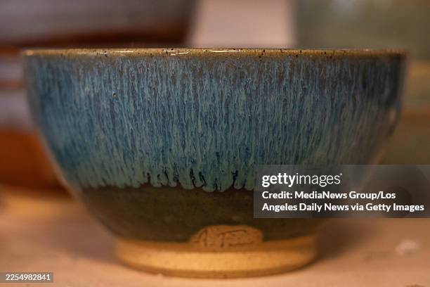 Pasadena, CA An example ash bowl for Eaton fire survivors is seen at A-Frame Pottery studio in Pasadena on Monday, January 5, 2026 where Eric and...