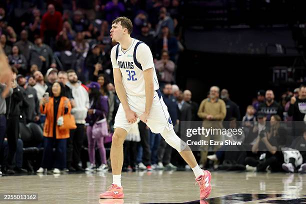 Cooper Flagg of the Dallas Mavericks reacts after Brandon Williams of the Dallas Mavericks made a three-point basket with 33 seconds left to give the...