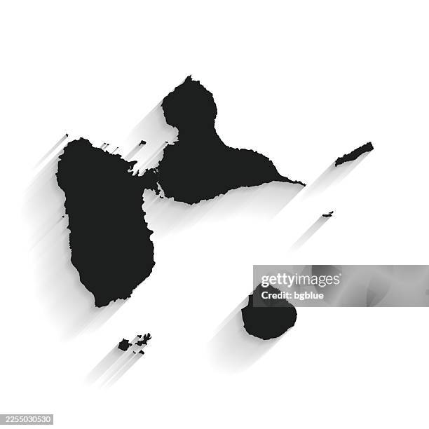 black guadeloupe map with long shadow on white background - flat design - guadeloupe stock illustrations