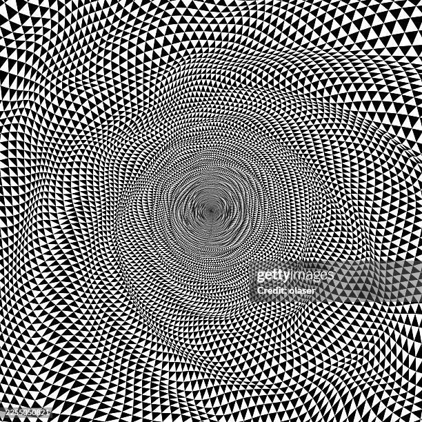 black and white triangles in swirl pattern. - vortex tunnel stock illustrations