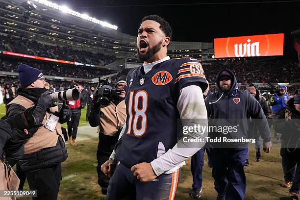 Caleb Williams of the Chicago Bears celebrates after an NFL Wild Card game against the Green Bay Packers at Solider Field on January 10, 2026 in...