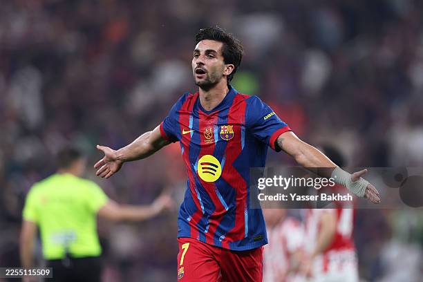 Ferran Torres of FC Barcelona celebrates scoring his team's first goal during the Spanish Super Cup Semi-Final match between Barcelona and Athletic...