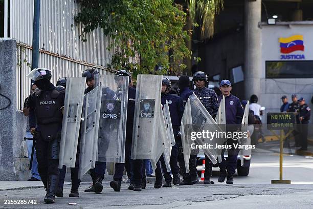 Police officers patrol before the release of prisoners at El Helicoide on January 08, 2026 in Caracas, Venezuela. Venezuelan political prisoners...