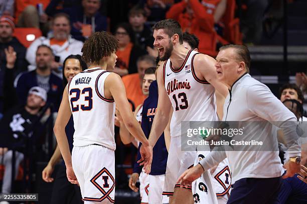 Keaton Wagler of the Illinois Fighting Illini reacts with Tomislav Ivisic during the second half against the Rutgers Scarlet Knights at State Farm...
