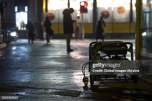 Generator runs outside during power outages on January 8, 2026 in Dnipro, Ukraine. Due to Russian attack, a blackout continues in Dnipro since the...