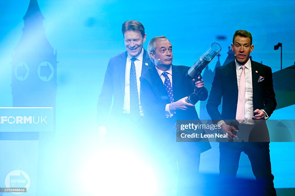 Reform Uk Spring Rally Leader of Reform UK Nigel Farage fires a t-shirt cannon at the end of ...