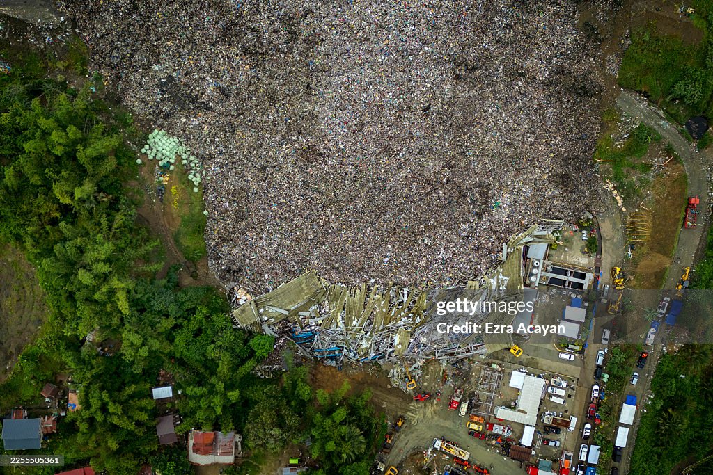 Landfill Collapse Traps Dozens In Philippines