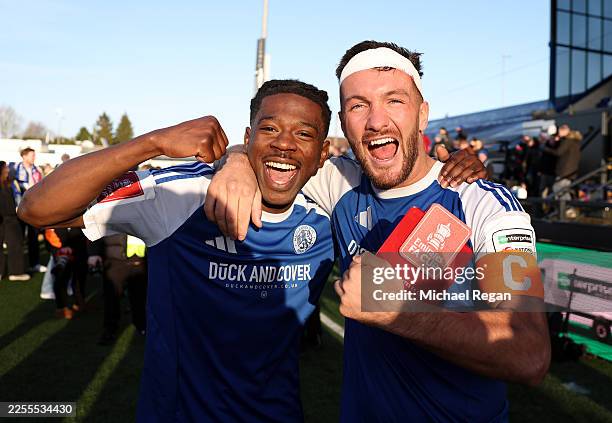 Isaac Buckley-Ricketts and Paul Dawson of Macclesfield celebrate after the team's victory following the Emirates FA Cup Third Round match between...