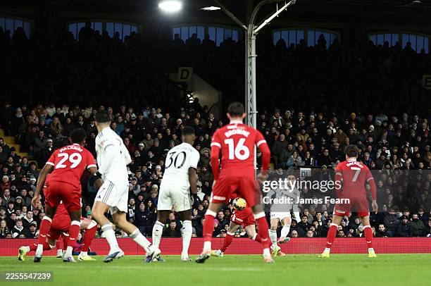 Harry Wilson of Fulham scores his team's first goal during the Emirates FA Cup Third Round match between Fulham and Middlesbrough at Craven Cottage...