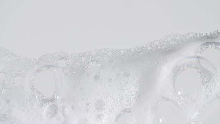 https://media.gettyimages.com/id/2255616094/video/bubbles-of-white-soap-foam-moving-soap-foam-popping-bubble-on-a-white-backdrop-soap-sud-macro.jpg?b=1&s=640x640&k=20&c=cYeeilQbrMHPSmNPtN7FNOivhW-5diCDsRwI2Gkths0=