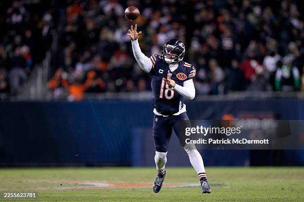 Caleb Williams of the Chicago Bears throws a pass against the Green Bay Packers during the third quarter in the NFC Wild Card Playoff game at Soldier...