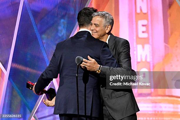 Noah Wyle accepts Best Actor / Best TV Actor for "The Pitt" from George Clooney onstage during the 2026 Annual Movies for Grownups Awards with AARP...