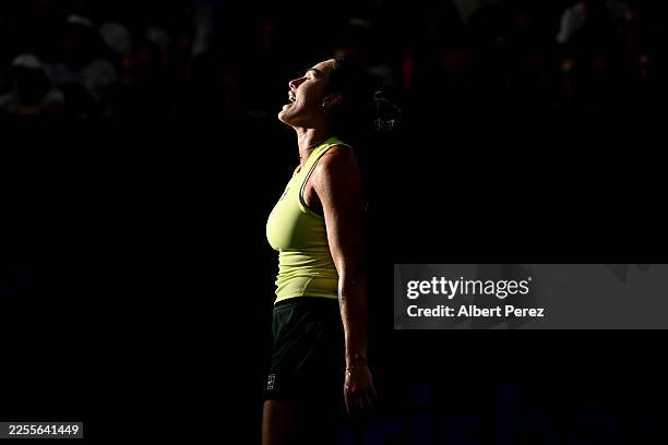 Aryna Sabalenka of Belarus celebrates a point in her Women's Singles Final match against Marta Kostyuk of Ukraine during day eight of the 2026...