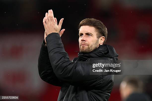 Fabian Huerzeler, Manager of Brighton & Hove Albion, applauds the fans following the Emirates FA Cup Third Round match between Manchester United and...