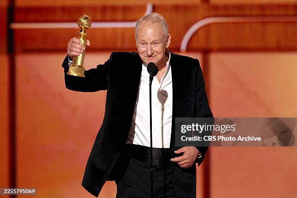 Stellan Skarsgård, winner of the Best Performance by a Male Actor in a Supporting Role in Any Motion Picture for "Sentimental Value," speaks onstage...