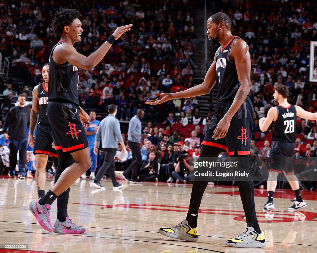 Houston Rockets Thompson Amen Thompson and Kevin Durant of the Houston Rockets high five... News ...