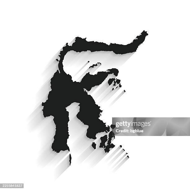 black sulawesi map with long shadow on white background - flat design - sulawesi stock illustrations
