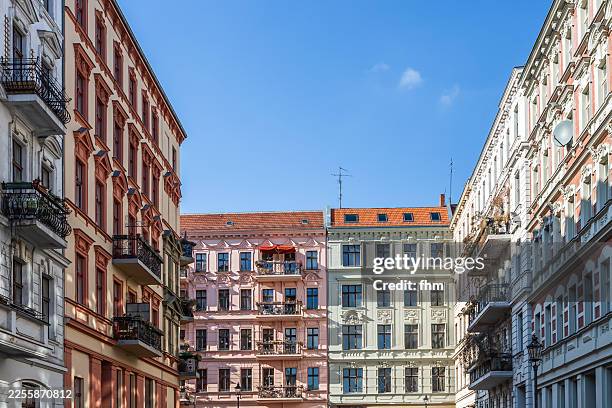 facades of historic residential buildings - mietshaus stock-fotos und bilder