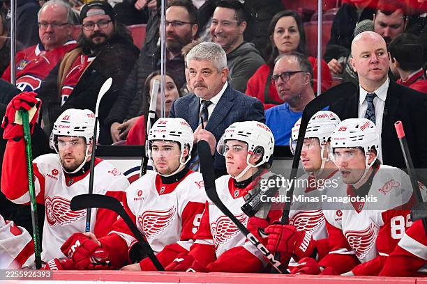 Head coach Todd McLellan and assistant coach Alex Tanguay of the Detroit Red Wings handle bench duties during the third period against the Montréal...