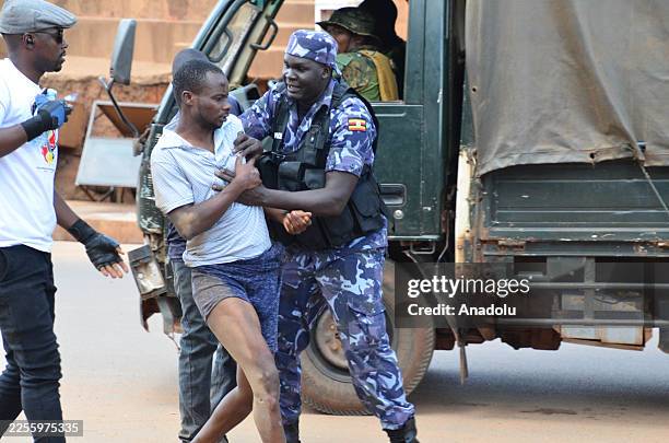 Ugandans stage protests in the capital Kampala following preliminary results of the general elections, with security forces intervening against some...