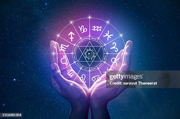 zodiac signs inside of horoscope circle. astrology in the sky with many stars and moons astrology and horoscopes concept - astrology stock pictures, royalty-free photos & images