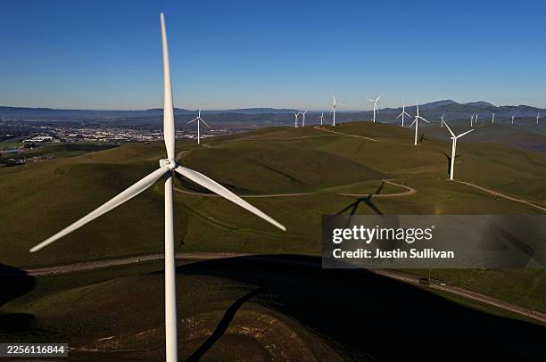 An aerial view of wind turbines at the Altamont Pass wind farm on January 13, 2026 in Livermore, California. A federal judge on Monday allowed...