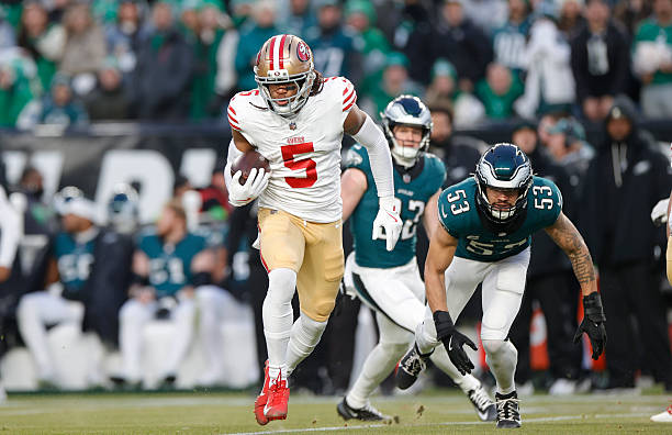 Demarcus Robinson of the San Francisco 49ers runs after making a catch during the NFC Wild Card playoff game against the Philadelphia Eagles at...