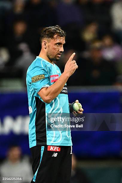 Zaman of the Heat signals one delivery left during the BBL match between Hobart Hurricanes and Brisbane Heat at Ninja Stadium, on January 14 in...