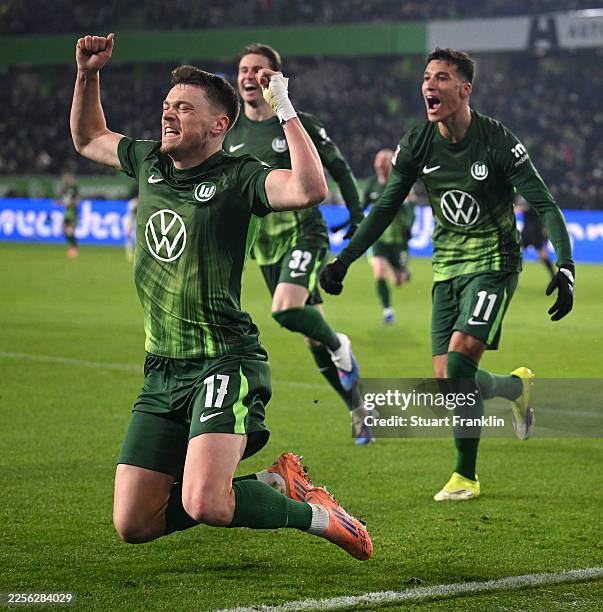 Dženan Pejcinovic of VfL Wolfsburg celebrates scoring his team's second goal during the Bundesliga match between VfL Wolfsburg and FC St. Pauli at...
