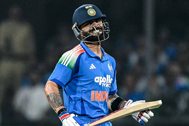 India's Virat Kohli reacts as he runs between the wickets during the third one-day international cricket match between India and New Zealand at the...