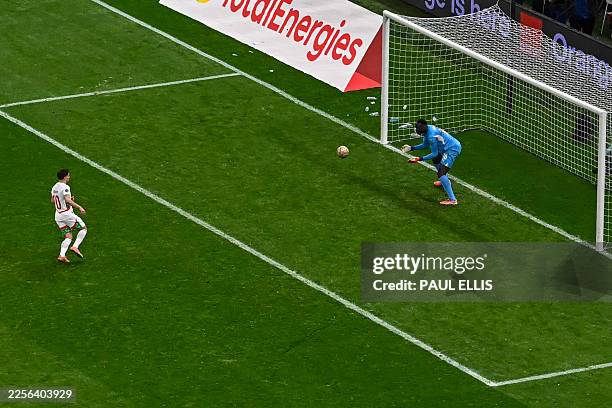 Morocco's forward Brahim Diaz misses a penalty in front of Senegal's goalkeeper Edouard Mendy during the Africa Cup of Nations final football match...