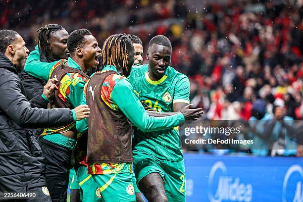 Rabat, Morocco Senegal's Pape Alassane Gueye celebrates his goal with team mates during the Africa Cup Of Nations Final match between Senegal and...