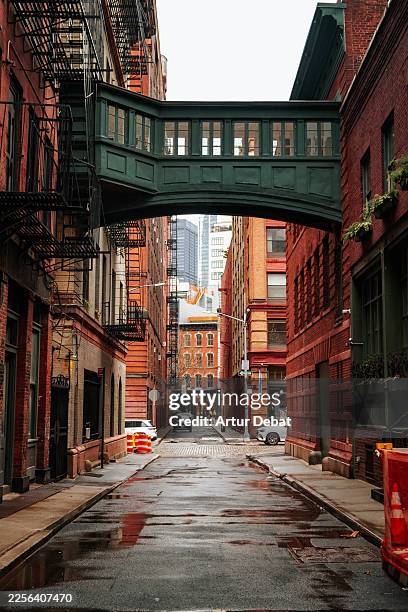 staple skybridge connecting buildings in tribeca, new york city. - west village stock pictures, royalty-free photos & images