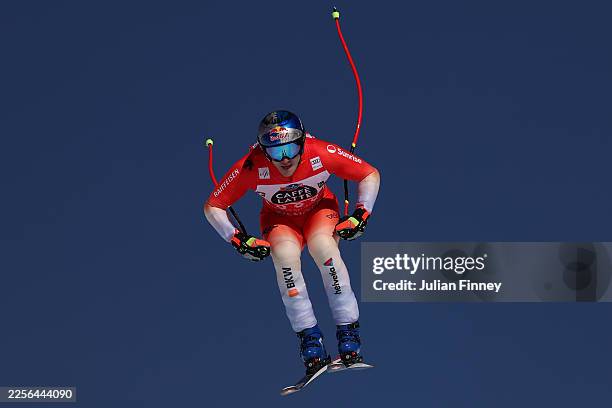 Marco Odermatt of Switzerland takes on the Hundschopf jump as he competes in the Audi FIS Alpine Ski World Cup Men's Downhill Training on January 15,...