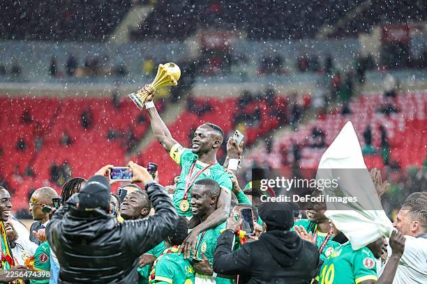 Rabat, Morocco Senegal's Sadio Mane celebrates winning with the trophy in his hands during the Africa Cup Of Nations Final match between Senegal and...