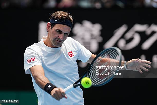 Roger Federer of Switzerland plays a backhand during a practice session ahead of the 2026 Australian Open at Melbourne Park on January 16, 2026 in...