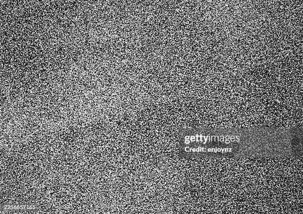 seamless stippled black grunge static noise dots pattern - television static stock illustrations