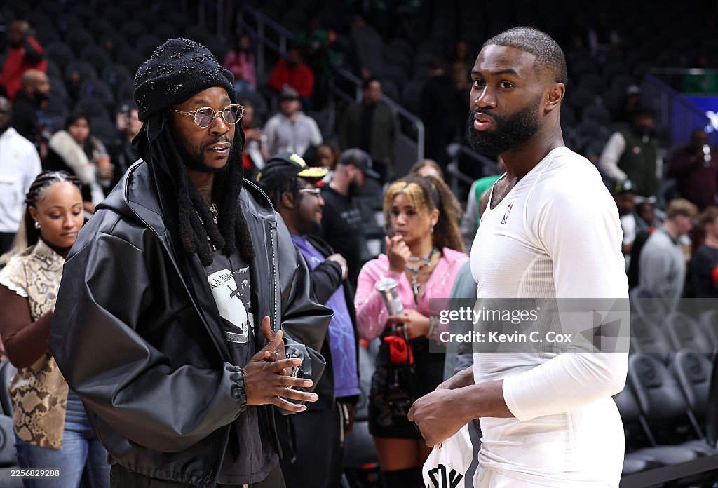 Boston Rapper Chainz Jaylen Brown of the Boston Celtics converses with rapper 2 Chainz ...
