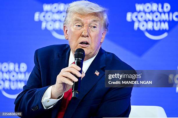 President Donald Trump speaks during the World Economic Forum annual meeting in Davos on January 21, 2026. The World Economic Forum takes place in...