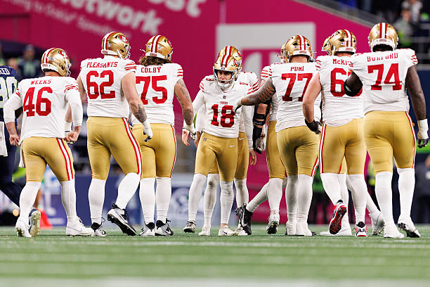 Eddy Piñeiro of the San Francisco 49ers celebrates with his teammates after kicking a field goal during the second quarter of an NFL divisional...