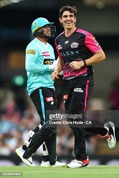 Sean Abbott of the Sixers celebrates dismissing Usman Khawaja of the Heat during the BBL match between Brisbane Heat and Sydney Sixers at the The...