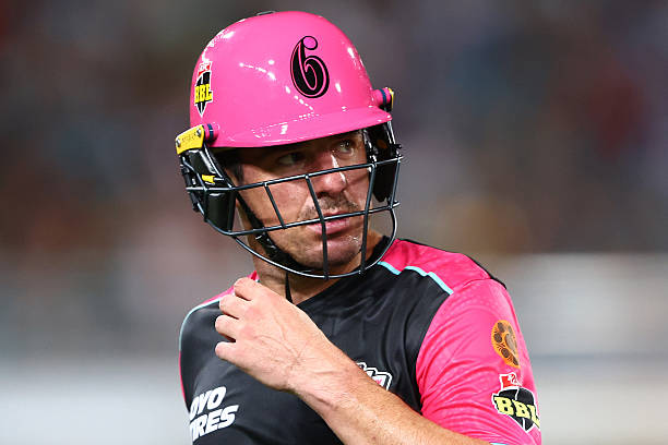 Moises Henriques of the Sixers leaves the field after being dismissed during the BBL match between Brisbane Heat and Sydney Sixers at the The Gabba,...