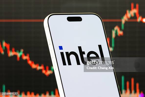 Intel Logo Shown on Smartphone with Latest Stock Market Chart Intel Logo Shown on Smartphone with Latest Stock Market Chart