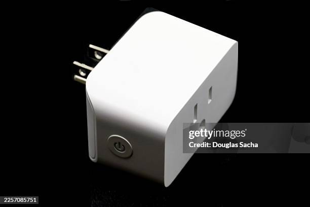 smart outlet for app control of appliance - smart plug stock pictures, royalty-free photos & images