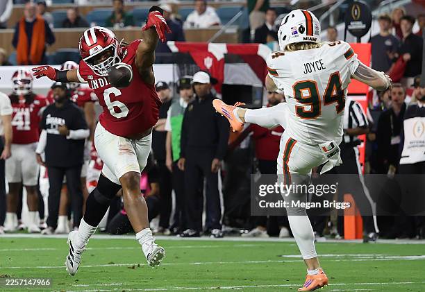 Mikail Kamara of the Indiana Hoosiers blocks a punt from Dylan Joyce of the Miami Hurricanes during the third quarter in the 2026 College Football...