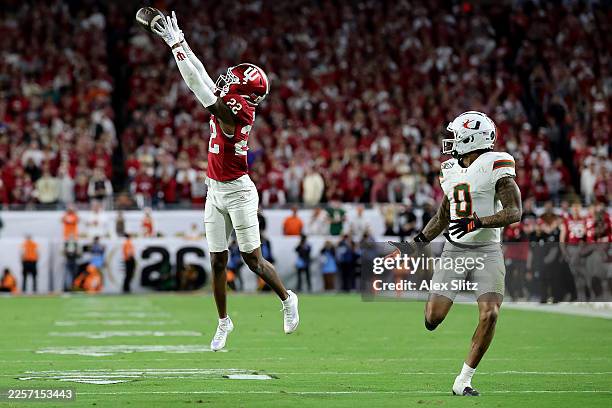Jamari Sharpe of the Indiana Hoosiers intercepts a pass intended for Keelan Marion of the Miami Hurricanes during the fourth quarter in the 2026...