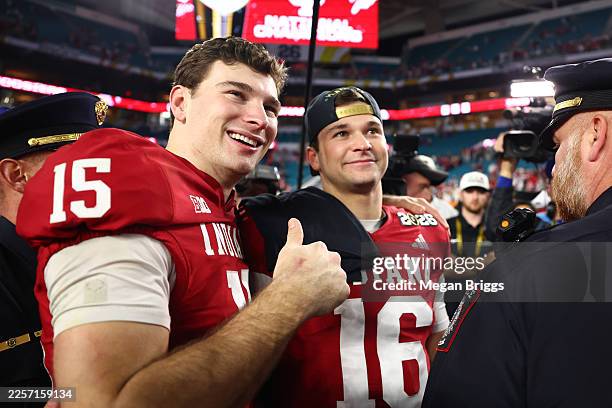 Fernando Mendoza celebrates with his brother Alberto Mendoza of the Indiana Hoosiers after defeating the Miami Hurricanes 27-21 in the 2026 College...